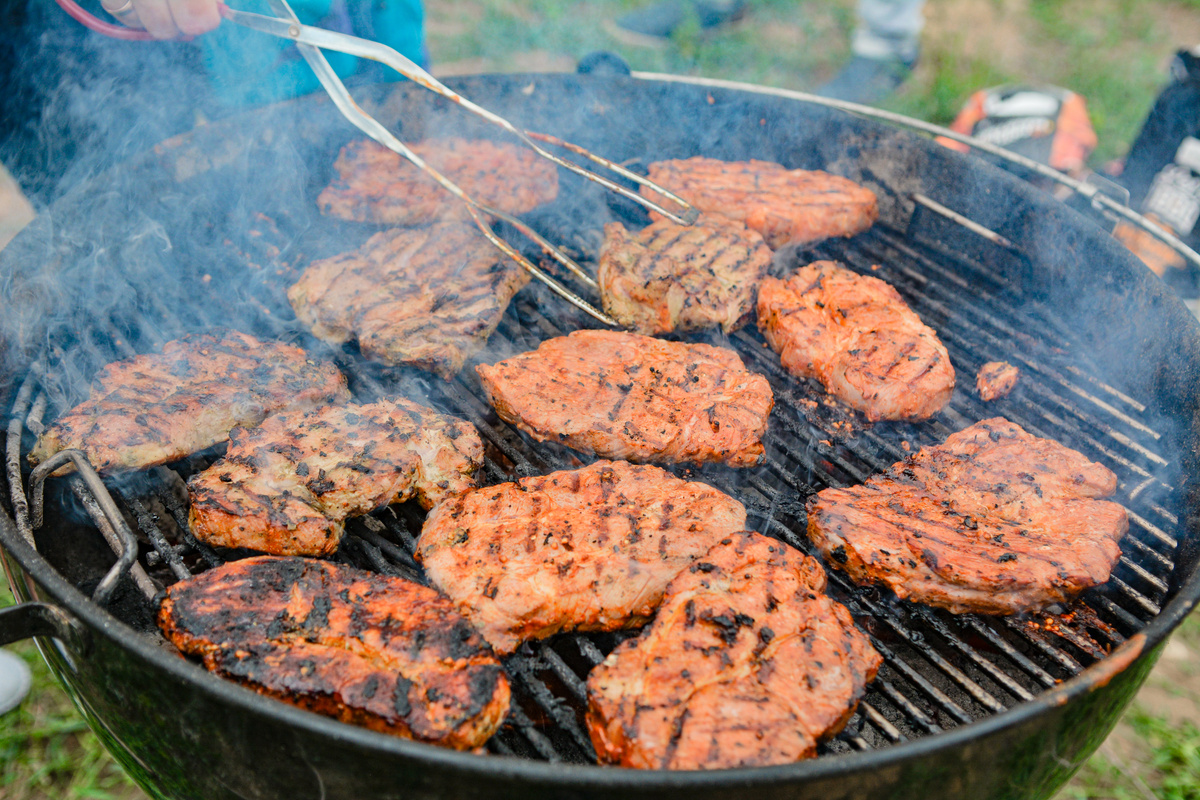 Grilled Meat on Black Charcoal Grill